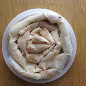 Continue spiraling phyllo rolls around the original spiral... and that's a wrap!