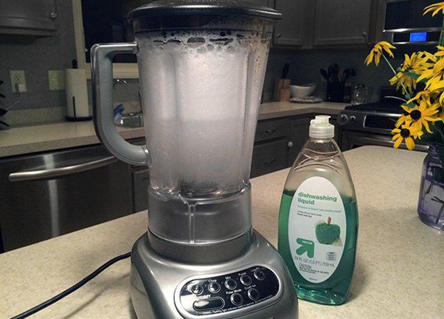 a blender filled with water and dishwashing liquid
